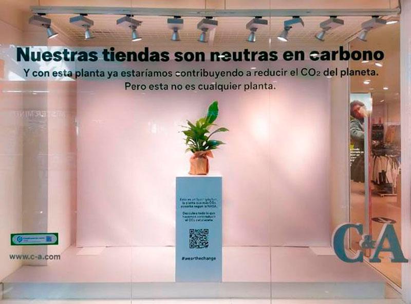 C&A strips off clothes and puts a plant in its windows