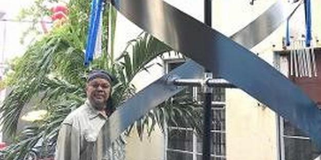 Artist Bernard Stanley Hoyes Delivers Symbolic Spiral Steel Sculpture To Jamaica During The Pandemic