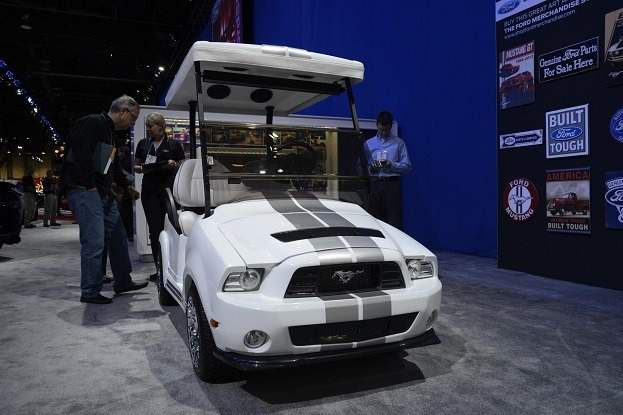 The fifth day car ceremony: Ford Shelby GT500 golf cart