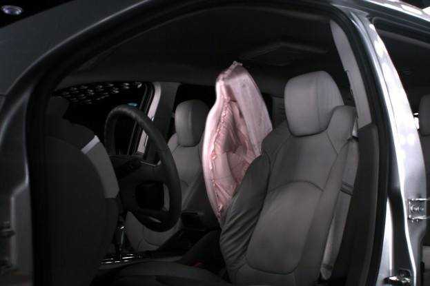 First in the industry: GM launched the first central front airbag on the Lambda crossover in 2013