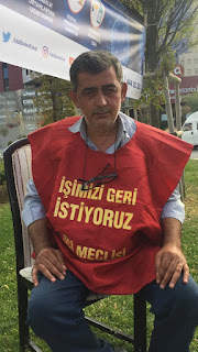 Resisting Worker Turan Aktaş carried out a chain action in front of Şişli Municipality. 