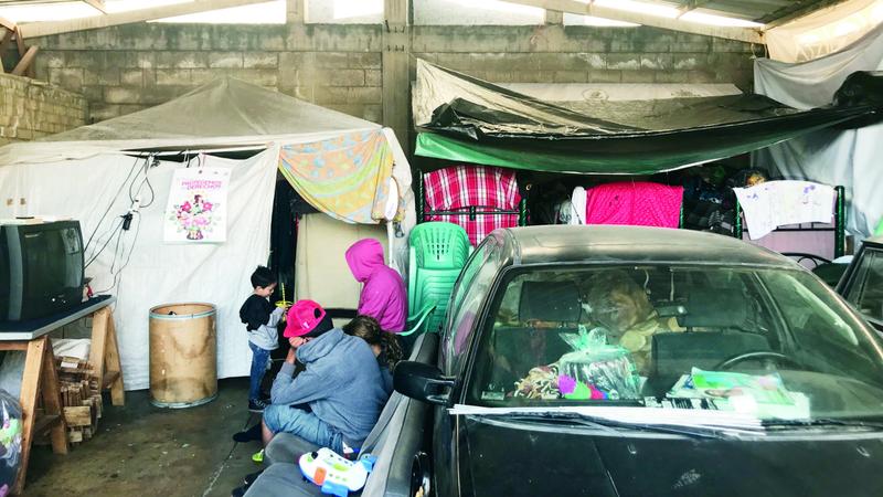 A mechanical workshop holds a migrant shelter in Metepec