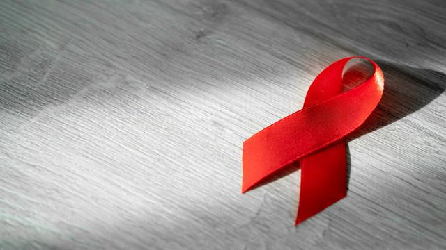 The Nation / AIDS: Human trials begin