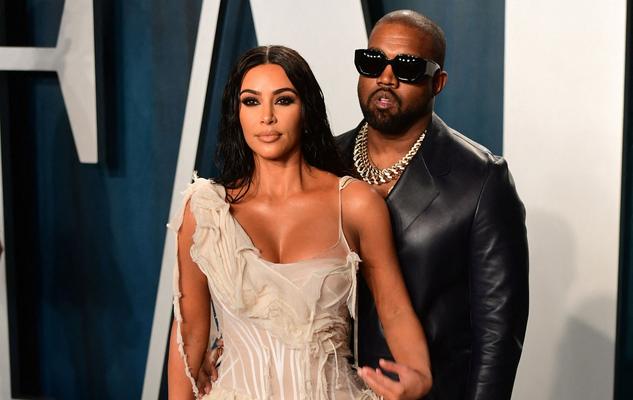 Séparés mais assortis : Kim Kardashian et Kanye West coordonnent leurs tenues lors d'une soirée à Atlanta