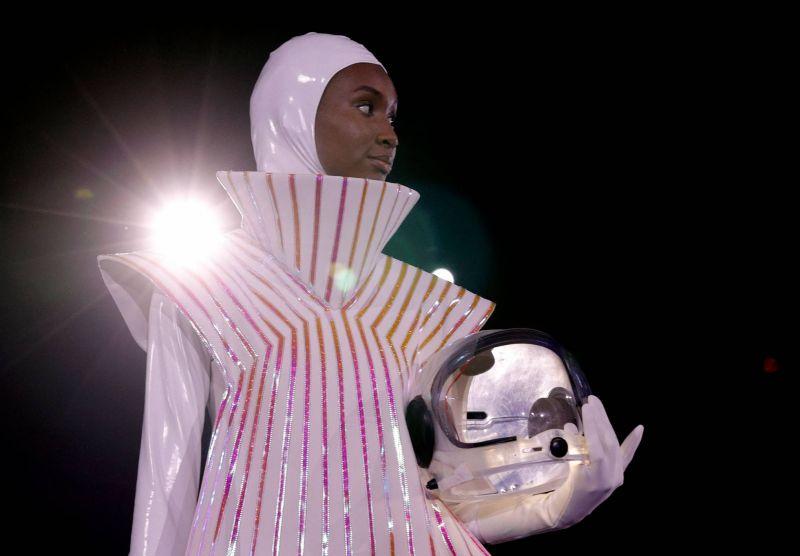 At the foot of a rocket, parade tribute to Pierre Cardin