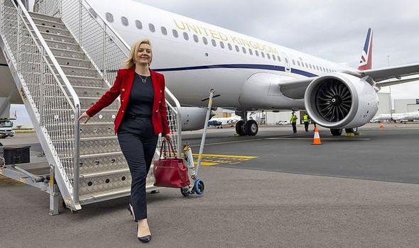 Liz Truss defends using government plane for Australia trip