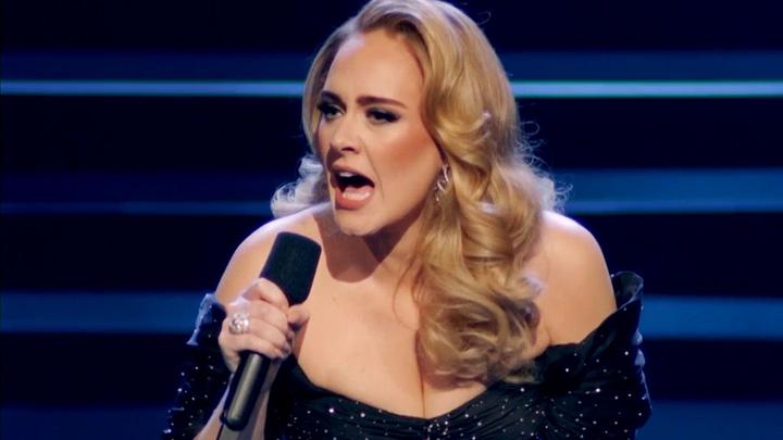 Adele cries at her concert - because she sees her teacher again