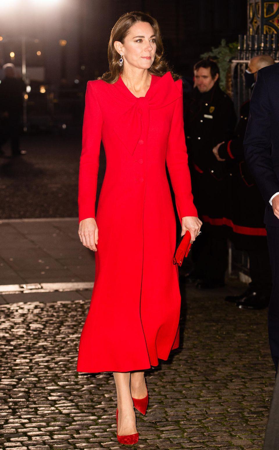Duchess Kate: In red & gold: Her outfit exudes a Christmas spirit
