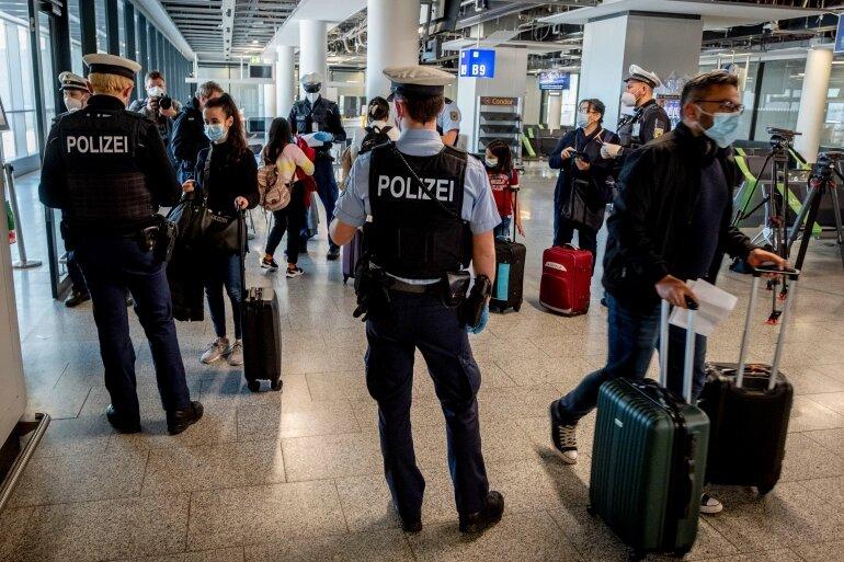 Germany tightens restrictions on travel from UK in bid to curb Omicron spread 