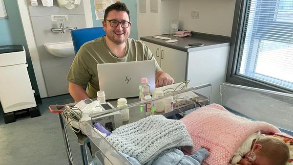 Scots dad of premature twins 'working from home' at hospital bedside after vowing to 'not leave them'
