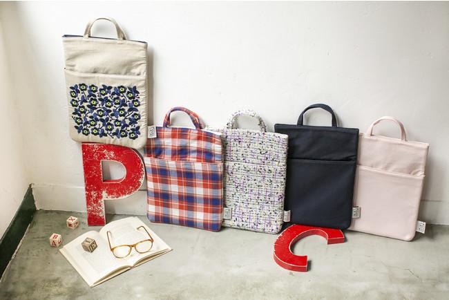 A thin and lightweight tote bag "Tote Panini" that is perfect for carrying a 13 -inch laptop