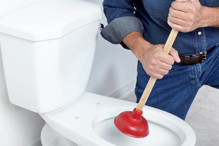 How To Fix A Clogged Toilet Using A Trash Bag