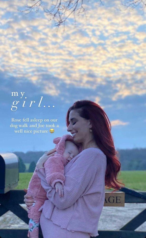 Stacey Solomon can't stop smiling as baby Rose falls asleep in her arms on her walk with Joe Swash