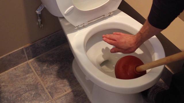 What Causes Big, Toilet-Clogging Poops? 