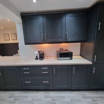 Couple saves thousands creating stunning black kitchen for under £850 themselves 