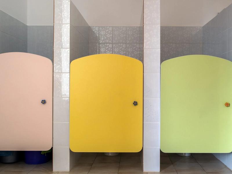 Do You Know Why Toilet Doors are Cut From Bottom in Malls and Offices? Read On to Find Out