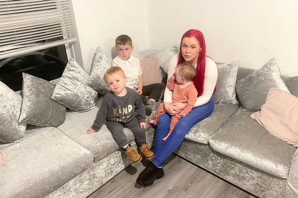 Couple and two kids 'at breaking point' after sleeping on sofa for two years