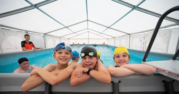 Giant inflatable swimming pool set up at Stoke-on-Trent school