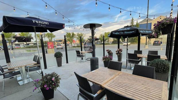 Calgary pizzeria looks for help finding stolen patio chair