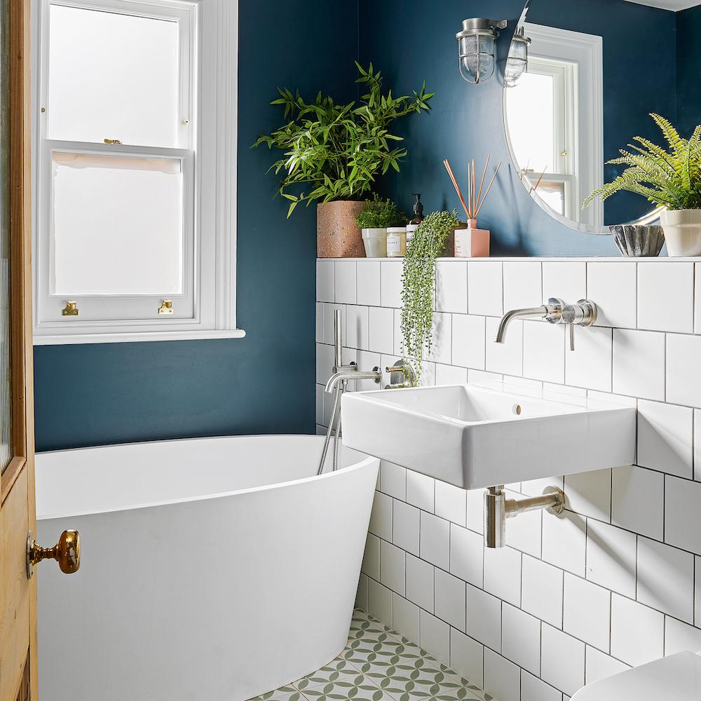 Create a trendy bathroom with a white color palette 