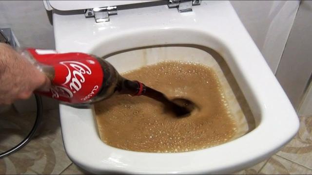 Can a can of Coke clean a grubby toilet?