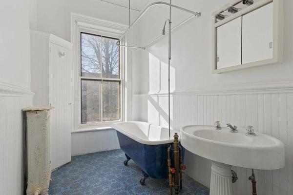 Singular PLG Mid-Century House With Colorful Vintage Baths, Garage Asks $2.895 Million
