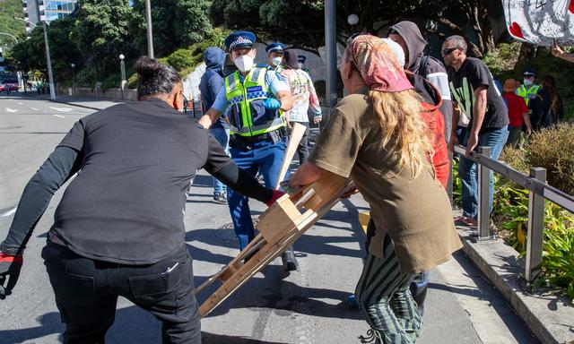 Covid 19 Omicron outbreak: Protesters set up portable shower block as Covid infection grows 