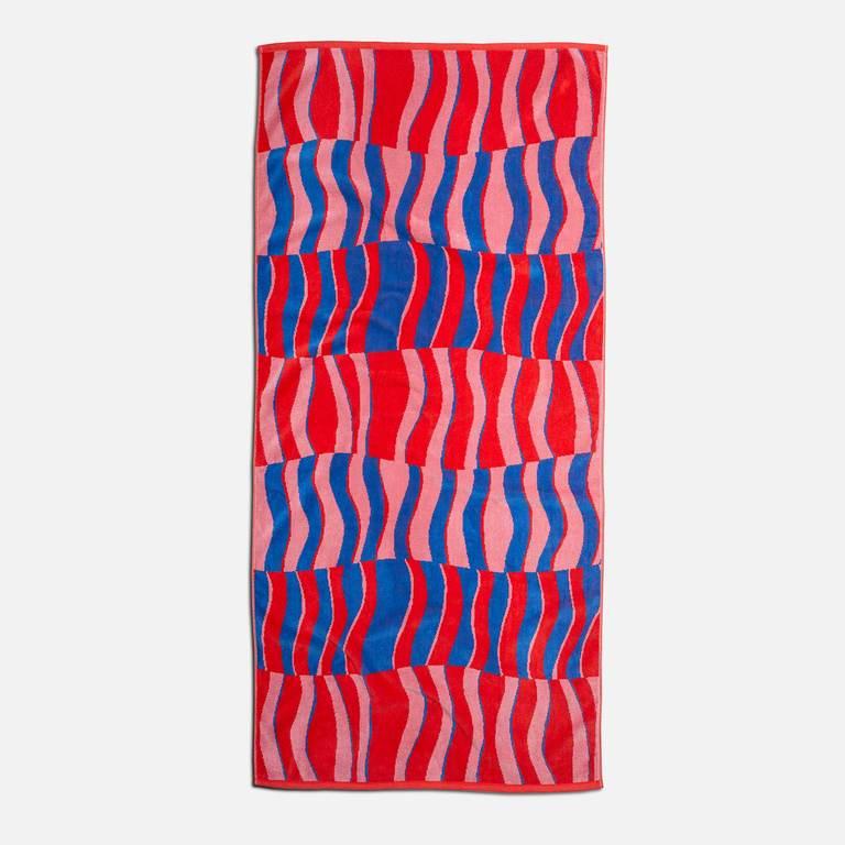 Brooklinen just dropped a line of beach towels that’ll put you in a summer mood 