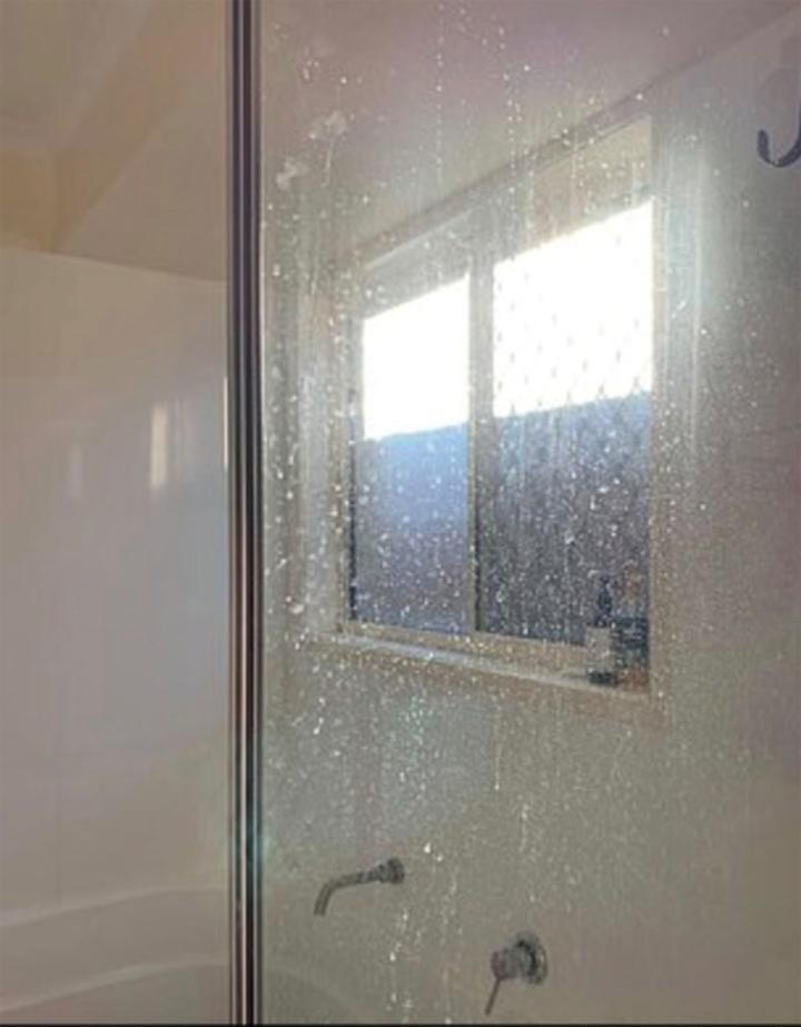 Woolworths shopper’s miracle shower screen transformation - using two bargain buys