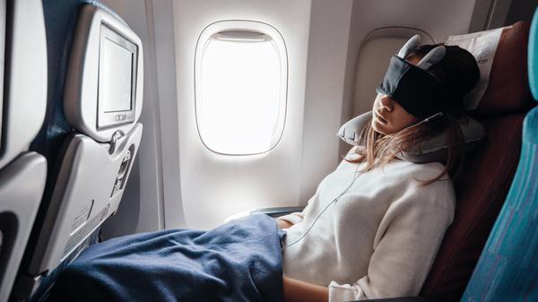 Want to sleep better on your next flight? Follow these 13 tips 