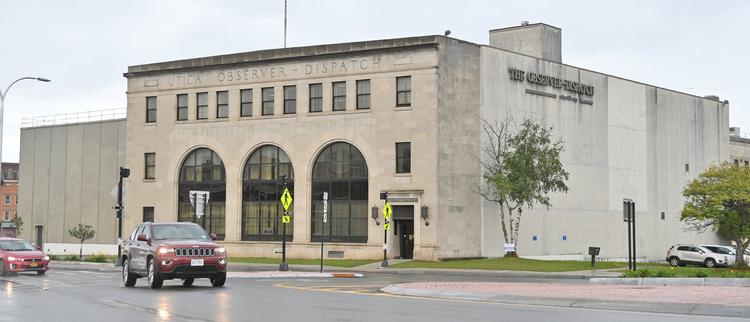 Who Purchased the Enormous Observer-Dispatch Building in Utica?