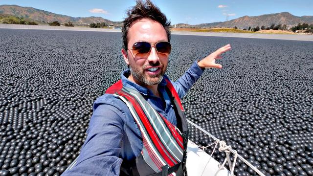 96,000,000 black balls in the Los Angeles reservoir. why?