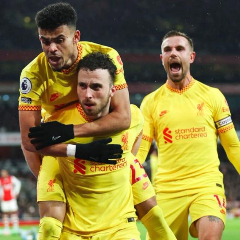 Liverpool sink Arsenal to boost title bid