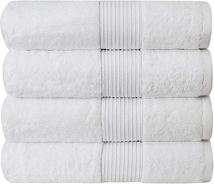 The Coziest Towel Sets & Warmers to Make Your Bathroom Feel Like a Spa 