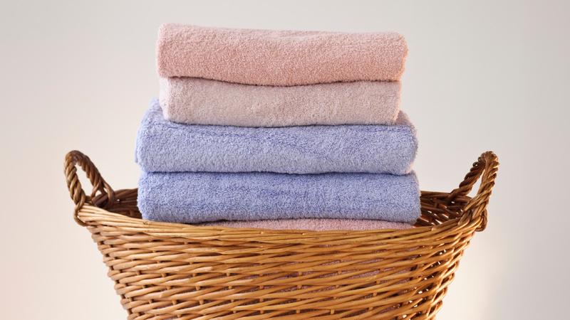 Why you should stop washing your towels and tea towels together