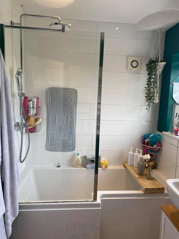 Woman gives bathroom modern makeover by upcycling shower screen for less than £9 