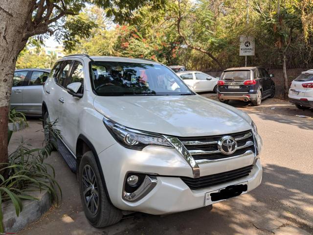 Toyota Fortuner: How to enable driver's door linked unlocking 