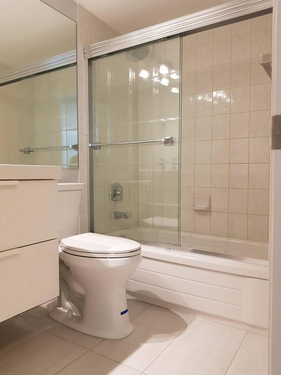 Glass shower doors must be removed to fix rollers