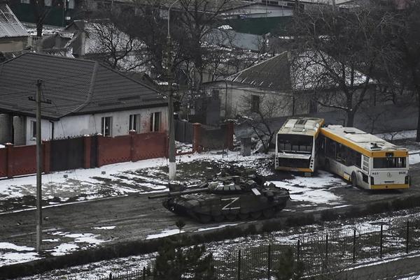 Dramatic moment tank blasts apartment block in Mariupol as Putin's troops continue assault on besieged city