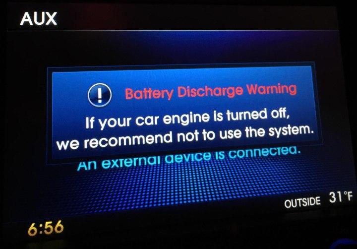 Why am I getting a ‘battery discharge’ warning on my car’s dashboard? 