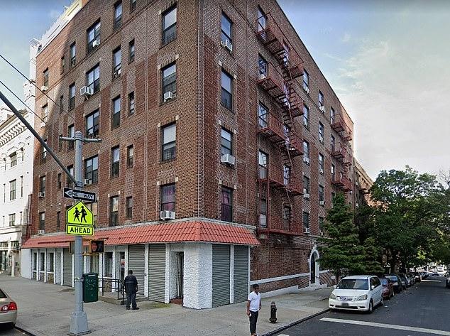 Manhattan woman, 50, is found dead in blood-filled bathtub as police hunt for her boyfriend
