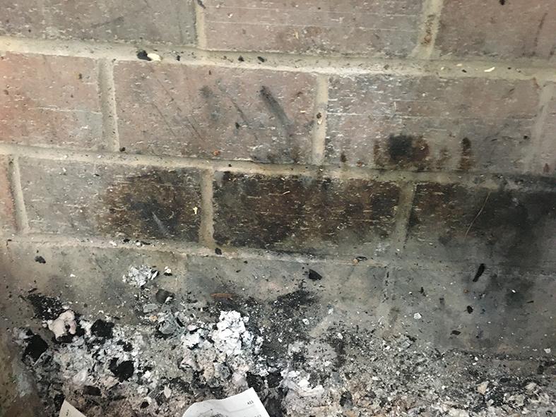 How to remove ash buildup from fireplace bricks 