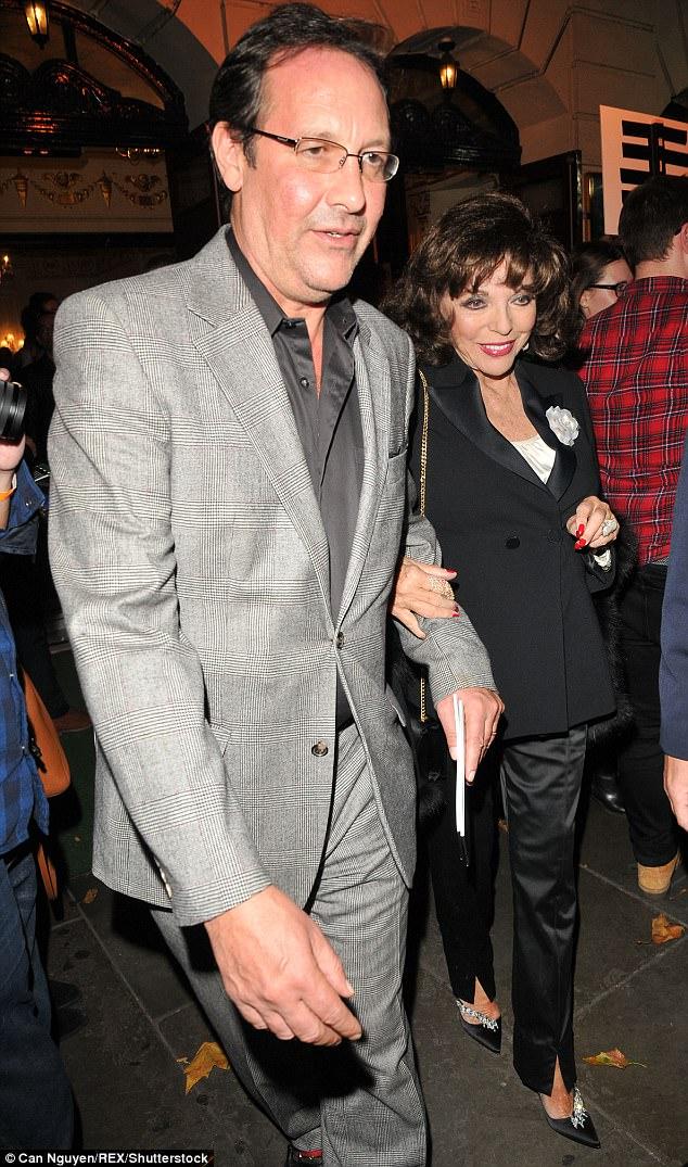 Joan Collins is arm-in-arm with younger beau Percy Gibson 