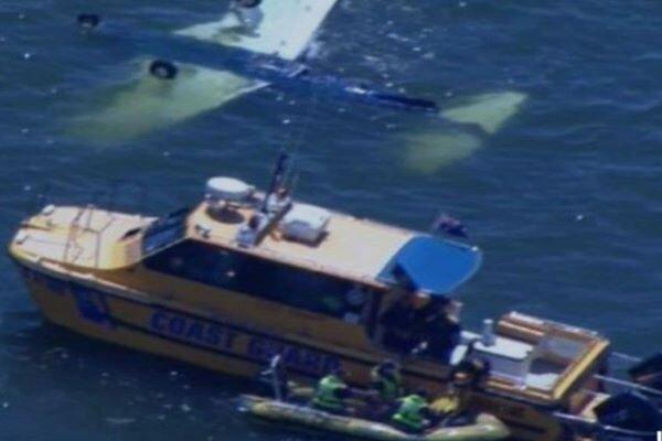 Two children among four dead in light plane crash off Queensland coast 