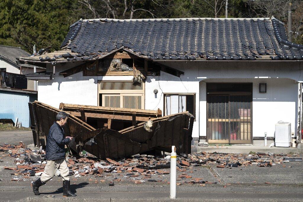 Residents Survey Damage After Powerful Japan Quake 