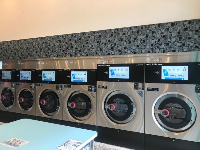 Japan's first coin-operated washer/dryer equipped with a full-screen touch panel. Company Release | Nikkan Kogyo Shimbun Electronic Edition