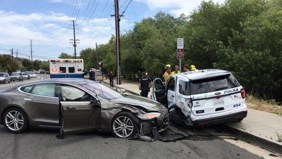 Tesla car on autopilot hits parked police car in Florida