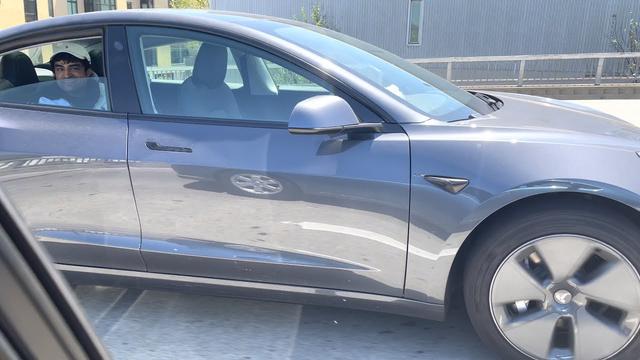 Watch: 'Driver' spotted in back seat of Tesla on Autopilot with no one at the wheel