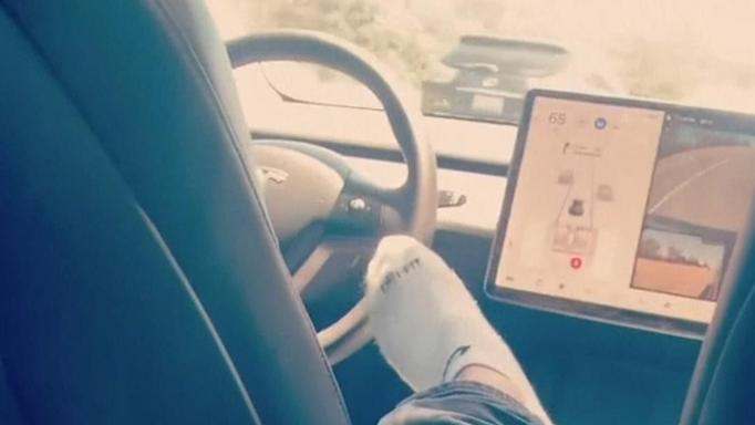 Watch: 'Driver' spotted in back seat of Tesla on Autopilot with no one at the wheel 
