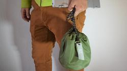 A drawstring bag that can compactly store items that you always carry around.